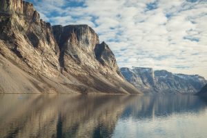 A scenic rocky fjord with steep cliffs. 