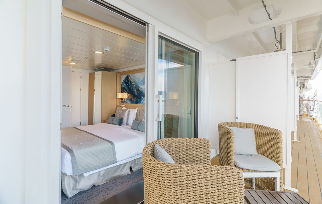 two chairs on the balcony of junior suite on Ocean Explorer