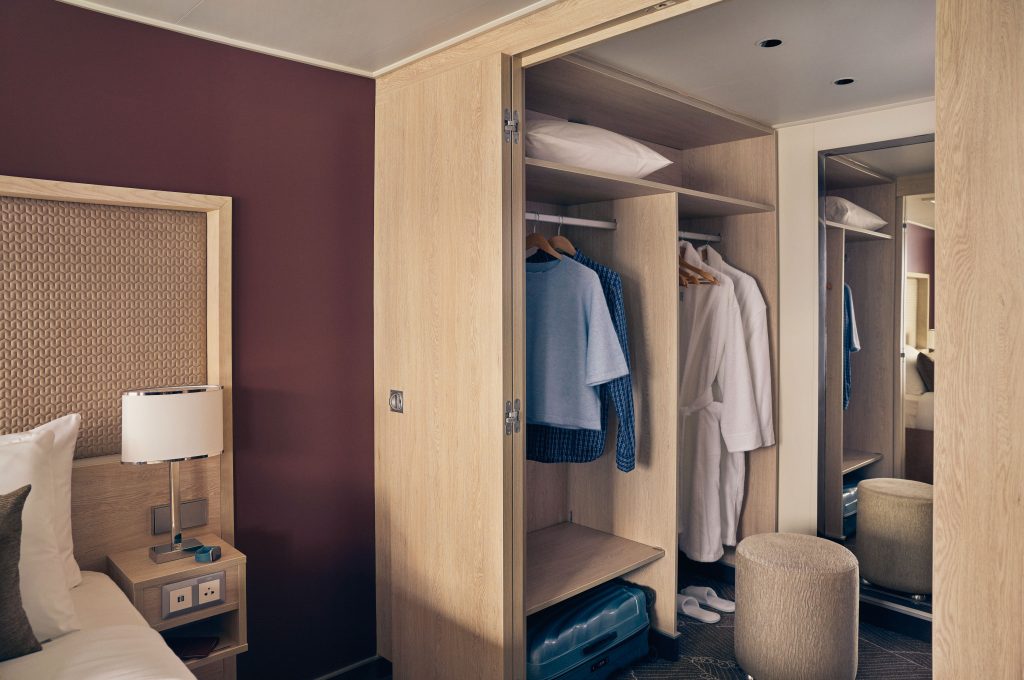 Walk in closet in Category 7 cabin on National Geographic Endurance & Resolution