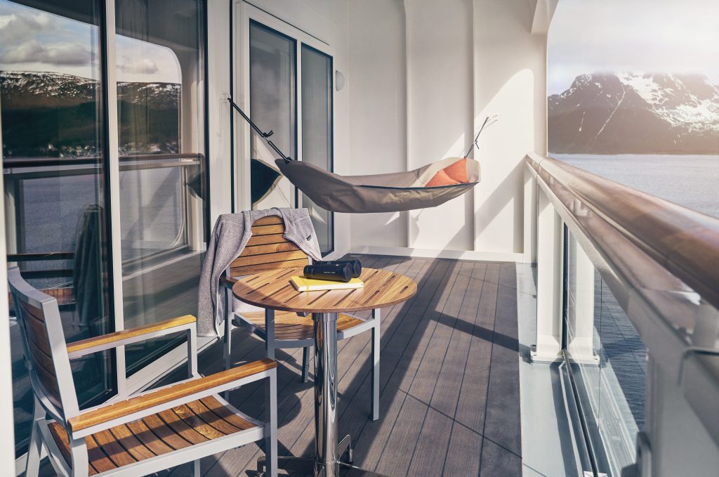 Balcony with chairs and hammock on National Geographic Endurance & Resolution