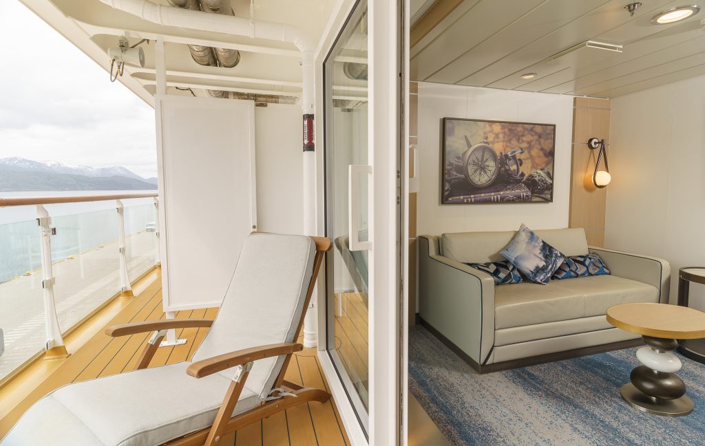 view of balcony with chair and sitting area with couch