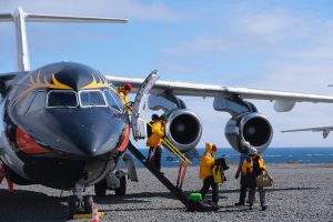 Guests getting off plane in Antarctica.
