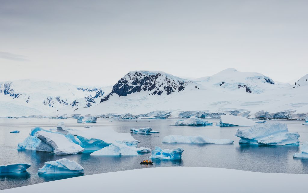 Antarctic landscape with icebergs.