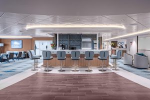 The Nordic Bar on Ocean Victory with 7 barstools and a lounge area to the side.