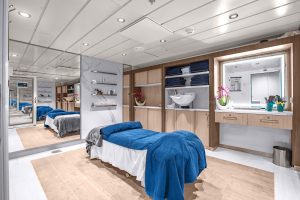 Spa with a treatment bed on the ship Ocean Victory.